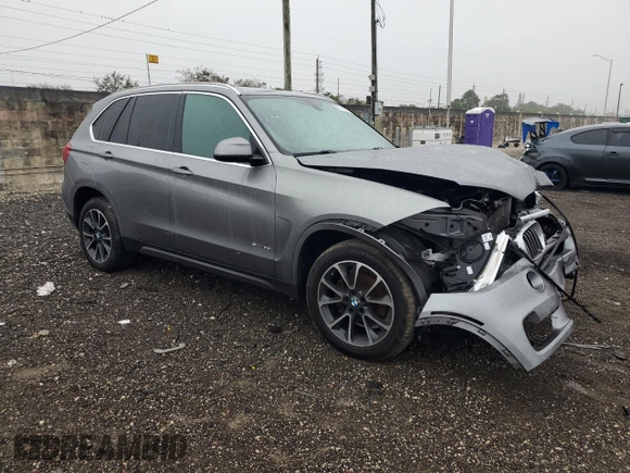 2017 BMW X5 sDrive35i with VIN 5UXKR2C36H0X04777, listed as a Copart auction lot 87718635 with 0 mi miles and Salvage Title. Bid and sale history available at carsss.com. Image 4.