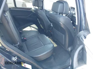 2008 BMW X5 3.0si with VIN 5UXFE43588L025702, listed as a IAAI auction lot 41705837 with 184,296 mi miles. Bid and sale history available at carsss.com. Image 8.