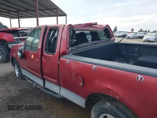 1999 Ford F-150 XL with VIN 1FTRX17L0XKA67494, listed as a IAAI auction lot 41603503 with Not Provided miles. Bid and sale history available at carsss.com. Image 6.