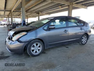 2007 Toyota Prius z VIN JTDKB20U973206119, wystawiony jako Copart lot #50452615 z przebiegiem 217 715 mil mil oraz Szkoda całkowita • Salvage title. Historia ofert i sprzedaży dostępna na DreamBid. Obrazek 1.