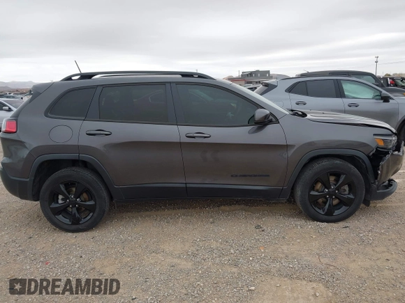 2020 Jeep Cherokee Latitude Plus with VIN 1C4PJLLB2LD570914, listed as a IAAI auction lot 40933764 with 49,886 mi miles. Bid and sale history available at carsss.com. Image 13.