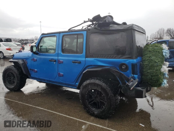 2023 Jeep Wrangler Sport S with VIN 1C4HJXDNXPW543376, listed as a Copart auction lot 86488024 with 35,935 mi miles and Salvage Title. Bid and sale history available at DreamBid. Image 2.