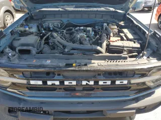 2022 Ford Bronco with VIN 1FMEE5DP3NLB62749, listed as a Copart auction lot 52227435 with 59,444 mi miles and Salvage Title. Bid and sale history available at DreamBid. Image 12.