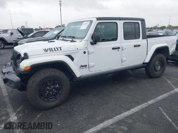 2022 Jeep Gladiator Willys with VIN 1C6HJTAG1NL148524, listed as a IAAI auction lot 41507693 with 42,004 mi miles and . Bid and sale history available at DreamBid. Image 19.