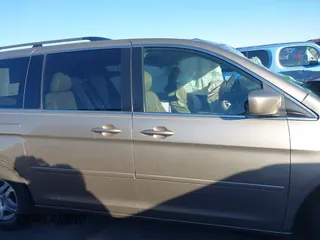2005 Honda Odyssey EX-L with VIN 5FNRL38755B063203, listed as a IAAI auction lot 41073372 with Not provided miles and . Bid and sale history available at DreamBid. Image 13.