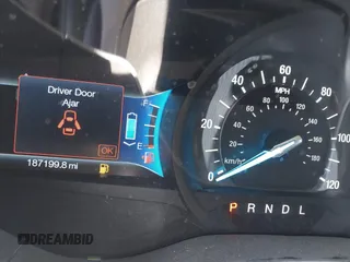 2014 Ford Fusion SE Hybrid with VIN 3FA6P0LUXER220053, listed as a IAAI auction lot 42229079 with 187,199 mi miles and . Bid and sale history available at DreamBid. Image 7.