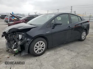 2021 Toyota Prius L Eco z VIN JTDKAMFU2M3148890, wystawiony jako Copart lot #60064065 z przebiegiem 58 226 mil mil oraz Szkoda całkowita • Salvage title. Historia ofert i sprzedaży dostępna na DreamBid. Obrazek 1.