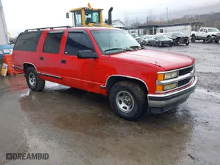 1999 Chevrolet Suburban with VIN 3GNEC16R7XG248641, listed as a IAAI auction lot 41964302 with 183,384 mi miles. Bid and sale history available at carsss.com. Image 1.