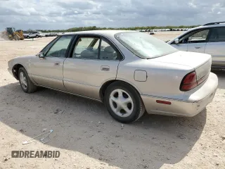 1997 Oldsmobile LSS z VIN 1G3HY52K9V4825297, wystawiony jako Copart lot #78541564 z przebiegiem Nie podano mil oraz Tytuł czysty. Historia ofert i sprzedaży dostępna na DreamBid. Obrazek 2.