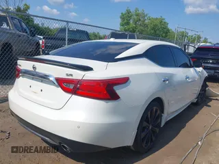 2017 Nissan Maxima SL with VIN 1N4AA6AP2HC411058, listed as a IAAI auction lot 42462494 with 107,341 mi miles and . Bid and sale history available at DreamBid. Image 4.