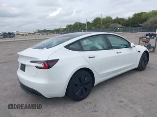 2025 Tesla Model 3 Long Range with VIN 5YJ3E1EA0SF932385, listed as a IAAI auction lot 41772613 with 1,683 mi miles and . Bid and sale history available at carsss.com. Image 4.