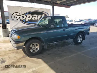 1998 Mazda B-Series Truck SX z VIN 4F4YR12C4WTM31865, wystawiony jako Copart lot #57178555 z przebiegiem 168 795 mil mil oraz Czysty tytuł • Clean title. Historia ofert i sprzedaży dostępna na DreamBid. Obrazek 1.