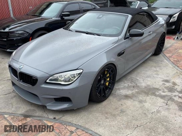 2016 BMW M6 z VIN WBS6G9C54GD932196, wystawiony jako Copart lot #53960063 z przebiegiem 46 162 mil mil oraz . Historia ofert i sprzedaży dostępna na DreamBid. Obrazek 2.