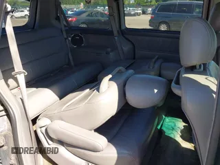 2003 Honda Odyssey EX-L z VIN 5FNRL18943B068332, wystawiony jako IAAI lot #42305497 z przebiegiem Nie podano mil oraz . Historia ofert i sprzedaży dostępna na DreamBid. Obrazek 8.