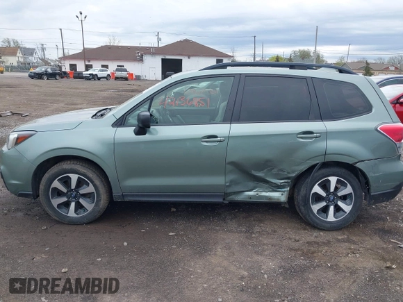 2017 Subaru Forester with VIN JF2SJABC3HH442661, listed as a IAAI auction lot 42136851 with 89,791 mi miles and . Bid and sale history available at DreamBid. Image 14.
