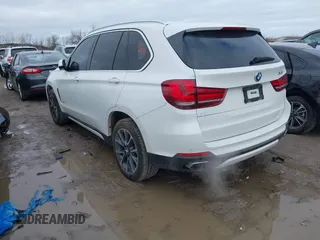 2018 BMW X5 xDrive35i with VIN 5UXKR0C56J0Y02820, listed as a IAAI auction lot 41783212 with 151,576 mi miles. Bid and sale history available at carsss.com. Image 3.