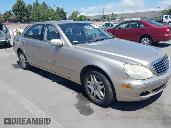 2003 Mercedes-Benz S-Class 4.3L with VIN WDBNG70J73A377067, listed as a IAAI auction lot 42137032 with 122,938 mi miles. Bid and sale history available at carsss.com. Image 1.