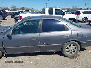 1998 Toyota Camry LE z VIN JT2BF22K6W0117441, wystawiony jako IAAI lot #41720451 z przebiegiem Nie podano mil oraz . Historia ofert i sprzedaży dostępna na DreamBid. Obrazek 14.