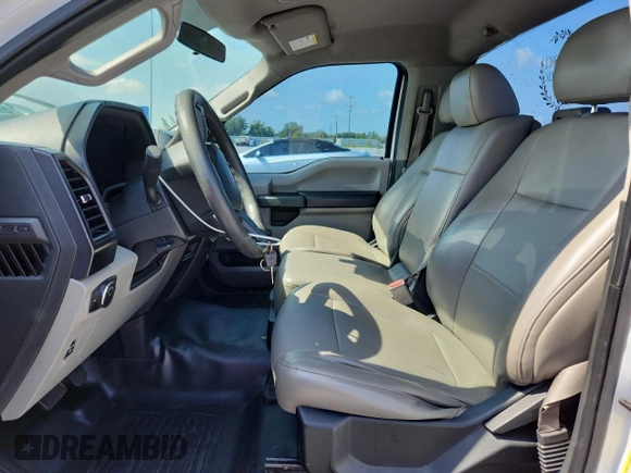 2016 Ford F-150 XL with VIN 1FTMF1C84GFC45611, listed as a Copart auction lot 61551625 with 127,010 mi miles and Salvage title. Bid and sale history available at DreamBid. Image 7.