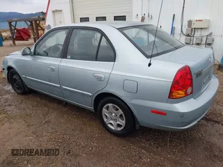 2003 Hyundai Accent GL with VIN KMHCG45C43U465523, listed as a IAAI auction lot 40883056 with 95,770 mi miles. Bid and sale history available at carsss.com. Image 3.