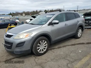 2010 Mazda CX-9 Grand Touring z VIN JM3TB3MV5A0210214, wystawiony jako Copart lot #51251585 z przebiegiem 138 885 mil mil oraz Szkody całkowita. Historia ofert i sprzedaży dostępna na DreamBid. Obrazek 1.