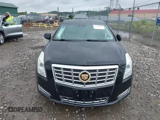 2014 Cadillac XTS Luxury with VIN 2G61M5S32E9231544, listed as a IAAI auction lot 42340088 with 74,518 mi miles and . Bid and sale history available at DreamBid. Image 12.
