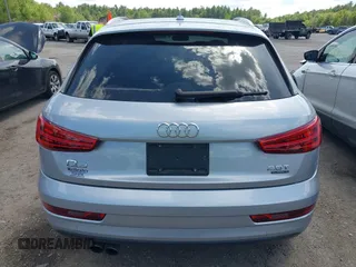 2018 Audi Q3 Premium with VIN WA1ECCFS0JR022112, listed as a IAAI auction lot 42356014 with 56,671 mi miles and . Bid and sale history available at DreamBid. Image 16.