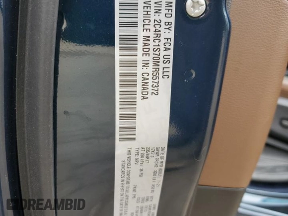2021 Chrysler Pacifica Hybrid Limited with VIN 2C4RC1S70MR557372, listed as a Copart auction lot 75748774 with 80,322 mi miles and Salvage title. Bid and sale history available at DreamBid. Image 14.