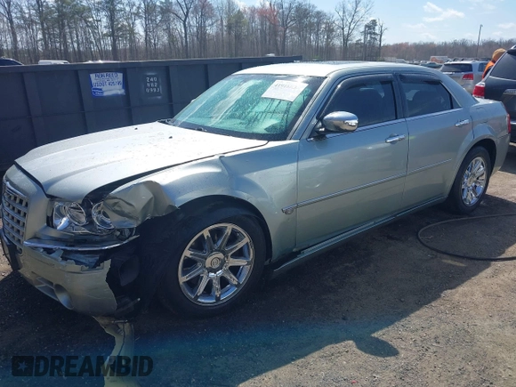 2006 Chrysler 300 C with VIN 2C3LA63H06H105774, listed as a IAAI auction lot 41918634 with 319,232 mi miles. Bid and sale history available at carsss.com. Image 2.