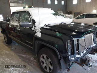 2015 GMC Sierra 1500 SLT with VIN 3GTU2VEC4FG251264, listed as a IAAI auction lot 40883499 with 207,004 mi miles and . Bid and sale history available at DreamBid. Image 1.