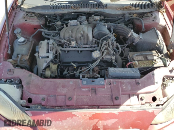 1997 Mercury Sable GS z VIN 1MELM50U6VG652538, wystawiony jako Copart lot #73302644 z przebiegiem 138 637 mil mil oraz Szkody całkowita. Historia ofert i sprzedaży dostępna na DreamBid. Obrazek 11.