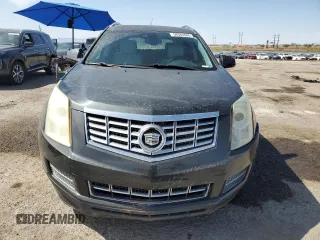 2015 Cadillac SRX Luxury Collection z VIN 3GYFNBE34FS541817, wystawiony jako Copart lot #58386685 z przebiegiem 51 731 mil mil oraz Szkoda całkowita • Salvage title. Historia ofert i sprzedaży dostępna na DreamBid. Obrazek 5.