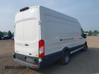 2018 Ford Transit z VIN 1FTBF4XV4JKB33236, wystawiony jako IAAI lot #42217712 z przebiegiem 120 826 mil mil oraz . Historia ofert i sprzedaży dostępna na DreamBid. Obrazek 4.