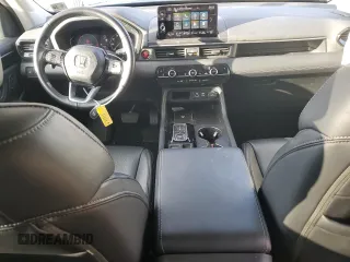 2023 Honda Pilot EX-L with VIN 5FNYG1H48PB044027, listed as a Copart auction lot 85114474 with 12,986 mi miles and Salvage title. Bid and sale history available at DreamBid. Image 8.