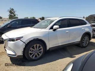 2021 Mazda CX-9 Grand Touring with VIN JM3TCBDY7M0502484, listed as a Copart auction lot 60744165 with 54,912 mi miles and Salvage title. Bid and sale history available at DreamBid. Image 1.
