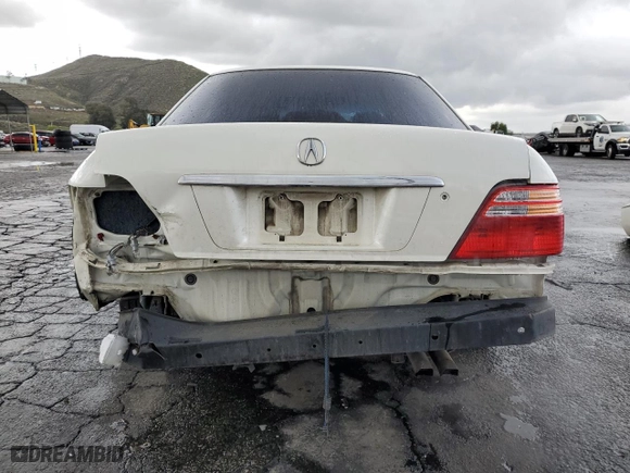 2001 Acura RL w/Navigation System with VIN JH4KA96671C001294, listed as a Copart auction lot 48045935 with 211,930 mi miles and Salvage Title. Bid and sale history available at carsss.com. Image 6.