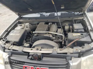 2003 GMC Envoy SLE z VIN 1GKDT13S332365071, wystawiony jako Copart lot #52811295 z przebiegiem Nie podano mil oraz Szkoda całkowita • Salvage title. Historia ofert i sprzedaży dostępna na DreamBid. Obrazek 13.