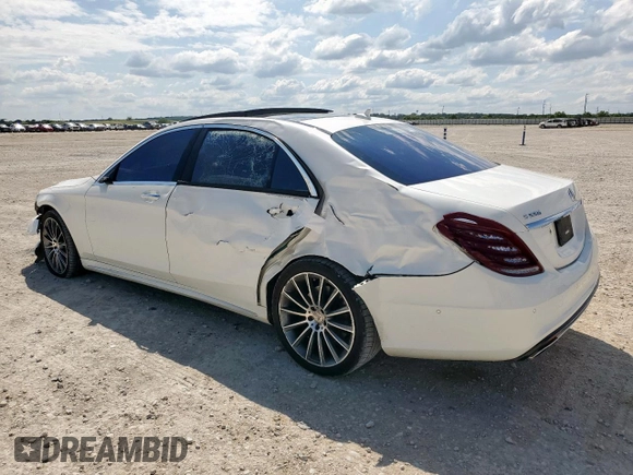 2015 Mercedes-Benz S 550 with VIN WDDUG8FB0FA164779, listed as a Copart auction lot 59945815 with 127,451 mi miles and Salvage title. Bid and sale history available at DreamBid. Image 2.