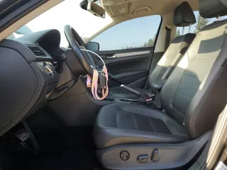 2014 Volkswagen Passat SE with VIN 1VWBT7A34EC107881, listed as a Copart auction lot 65431345 with 106,432 mi miles and Salvage title. Bid and sale history available at DreamBid. Image 7.