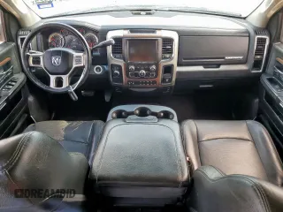 2014 Ram 2500 Laramie z VIN 3C6UR5FL4EG183158, wystawiony jako Copart lot #61846925 z przebiegiem 199 961 mil mil oraz Szkoda całkowita • Salvage title. Historia ofert i sprzedaży dostępna na DreamBid. Obrazek 8.