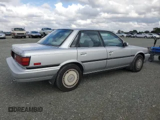 1989 Toyota Camry z VIN JT2VV22E3K0049538, wystawiony jako Copart lot #78870034 z przebiegiem 100 396 mil mil oraz Czysty tytuł • Clean title. Historia ofert i sprzedaży dostępna na DreamBid. Obrazek 3.