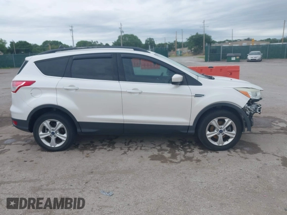 2014 Ford Escape SE with VIN 1FMCU9GX2EUA62133, listed as a IAAI auction lot 42342688 with Not provided miles and . Bid and sale history available at DreamBid. Image 14.