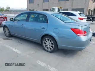 2007 Toyota Avalon XL with VIN 4T1BK36B37U204898, listed as a IAAI auction lot 42021234 with 130,014 mi miles and . Bid and sale history available at carsss.com. Image 3.