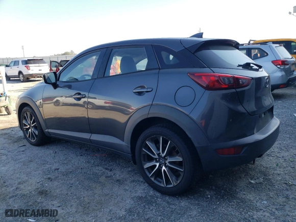2017 Mazda CX-3 Touring with VIN JM1DKFC71H0141369, listed as a Copart auction lot 44704115 with 83,410 mi miles and Salvage Title. Bid and sale history available at carsss.com. Image 2.