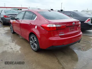2014 Kia Forte EX with VIN KNAFX4A81E5220515, listed as a IAAI auction lot 42073436 with 132,405 mi miles. Bid and sale history available at carsss.com. Image 3.