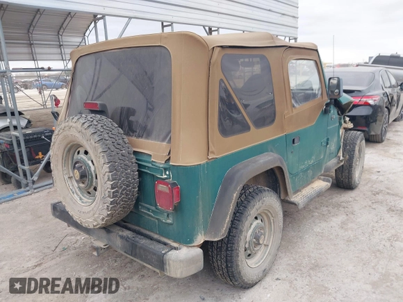 1997 Jeep Wrangler SE with VIN 1J4FY29P1VP408966, listed as a IAAI auction lot 41683640 with 106,910 mi miles. Bid and sale history available at carsss.com. Image 4.
