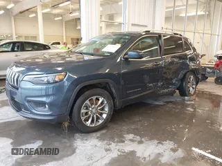 2019 Jeep Cherokee Latitude Plus with VIN 1C4PJMLX0KD361879, listed as a IAAI auction lot 40435950 with 148,830 mi miles. Bid and sale history available at carsss.com. Image 18.