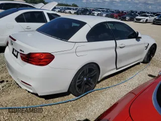 2015 BMW M4 with VIN WBS3U9C56FP968142, listed as a Copart auction lot 74034884 with Not Provided miles and Salvage Title. Bid and sale history available at carsss.com. Image 3.