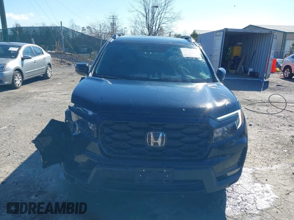 2023 Honda Passport Elite with VIN 5FNYF8H04PB006514, listed as a IAAI auction lot 41537826 with 14,640 mi miles and . Bid and sale history available at DreamBid. Image 13.