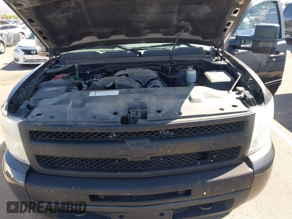 2010 Chevrolet Silverado 1500 LS with VIN 1GCSKREAXAZ137064, listed as a IAAI auction lot 42024758 with 125,401 mi miles and . Bid and sale history available at DreamBid. Image 10.